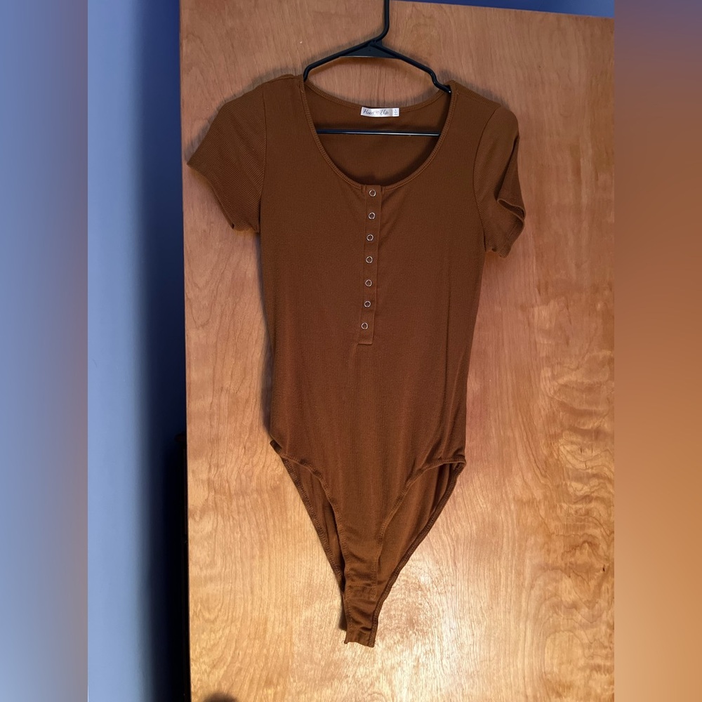 Large brown body suit